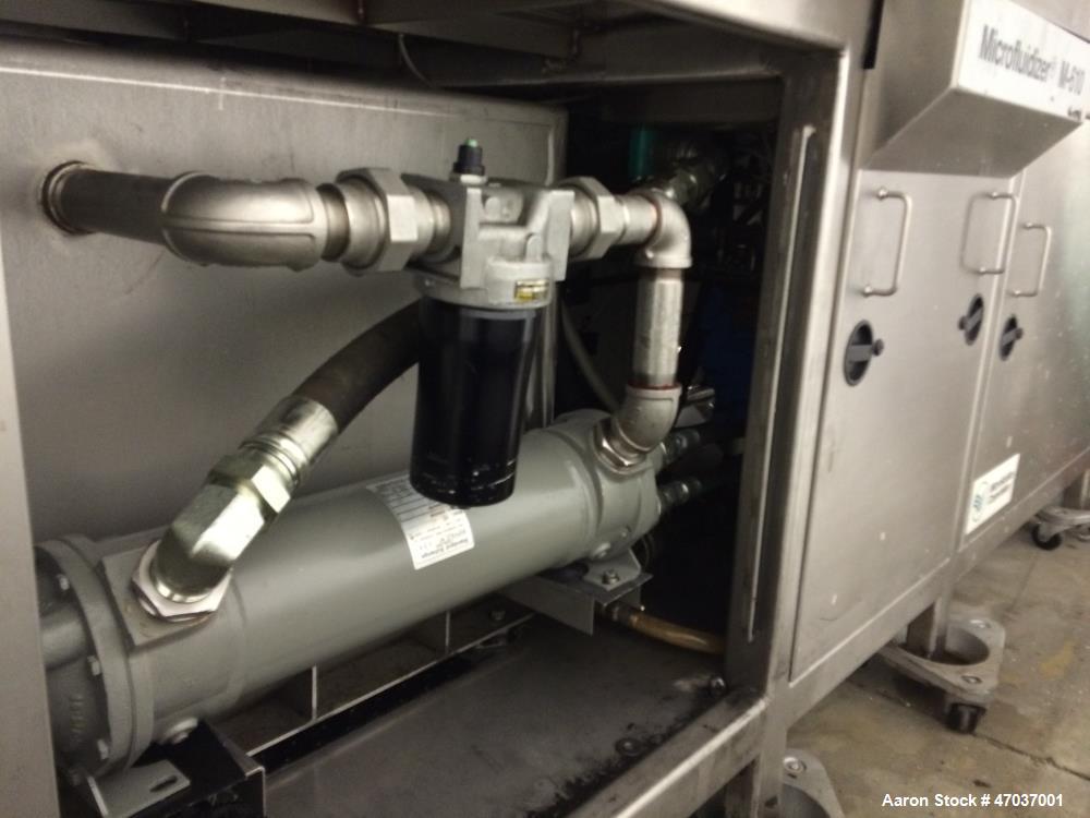Used Microfluidics Series Production Microfluidizer, Model M610-100. Stainless steel. Electrically driven, dual plunger, hydraulic intensifier pump to pressurize the process stream. Unit designed for...