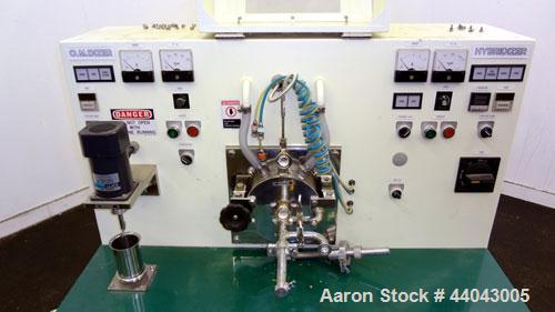 Used Nara Machinery Hybridization System, Model NHS-0, 304 Stainless Steel. Consists of (1) Model O.M. Dizer, approximate capacity 60 gram batch, 80-1600 rpm. Designed for powder mixing with an agita...
