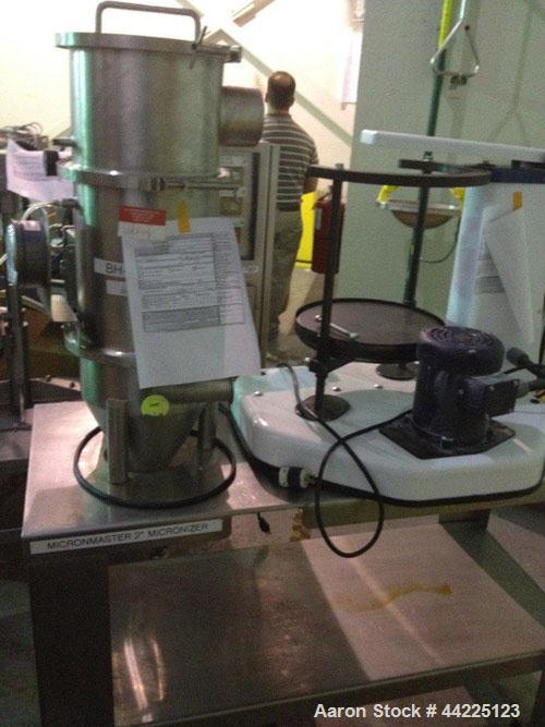 Used Sturtevant Micronizer Pulverizer, Model Q. Stainless steel construction, with Ktron feeder and dust collector, mounted on common stainless steel base.