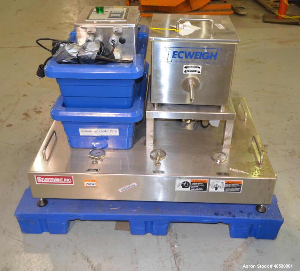 Used Sturtevant SDM4 Micronizer, Stainless Steel. (1) SDM4 table, parts and accessories. (1) Technweigh S5 Volumetric Feeder, 120 Volt, 1 speed, dual drive, digital batch timer, model 5. 1/8hp Motor....