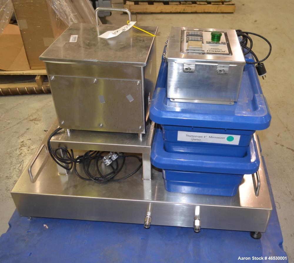 Used Sturtevant SDM4 Micronizer, Stainless Steel. (1) SDM4 table, parts and accessories. (1) Technweigh S5 Volumetric Feeder, 120 Volt, 1 speed, dual drive, digital batch timer, model 5. 1/8hp Motor....