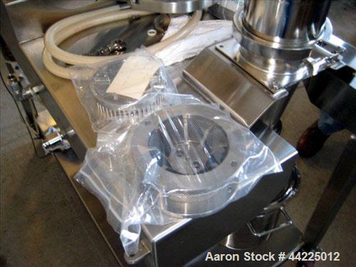 Used Sturtevant Micronizer, Model SSC4. With K-Tron model K2MVT20 feeder, 1/2 hp xp. Cyclone fines collector, on a stainless steel base. Serial #0300702.