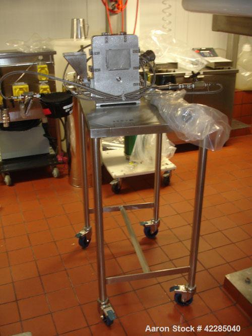 Used Trost 4" Jet Mill, stainless steel. Includes a stand with cyclone and feeder, and external collector. Price includes 15% buyer's premium.
