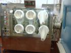 Used Jetpharma Jet Mill, Model MCJETMILL 50, Stainless Steel. Approximately 4’’ diameter. Rated .05-5 kg/hr, batch size 3g-20kg. Unit includes a Ktron twin screw feeder mounted in Isolation Solutions...
