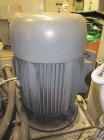 Used Kawasaki Kryptron Eddy Mill, driven by a 50 hp, 3/60/230/460 volt, 1780 rpm motor.
