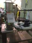 Used Sturtevant Micronizer Pulverizer, Model Q. Stainless steel construction, with Ktron feeder and dust collector, mounted on common stainless steel base.