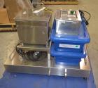 Used Sturtevant SDM4 Micronizer, Stainless Steel. (1) SDM4 table, parts and accessories. (1) Technweigh S5 Volumetric Feeder, 120 Volt, 1 speed, dual drive, digital batch timer, model 5. 1/8hp Motor....