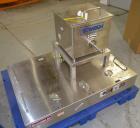 Used Sturtevant SDM4 Micronizer, Stainless Steel. (1) SDM4 table, parts and accessories. (1) Technweigh S5 Volumetric Feeder, 120 Volt, 1 speed, dual drive, digital batch timer, model 5. 1/8hp Motor....