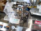 Used Sturtevant Micronizer, Model SSC4. With K-Tron model K2MVT20 feeder, 1/2 hp xp. Cyclone fines collector, on a stainless steel base. Serial #0300702.