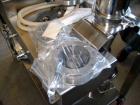 Used Sturtevant Micronizer, Model SSC4. With K-Tron model K2MVT20 feeder, 1/2 hp xp. Cyclone fines collector, on a stainless steel base. Serial #0300702.