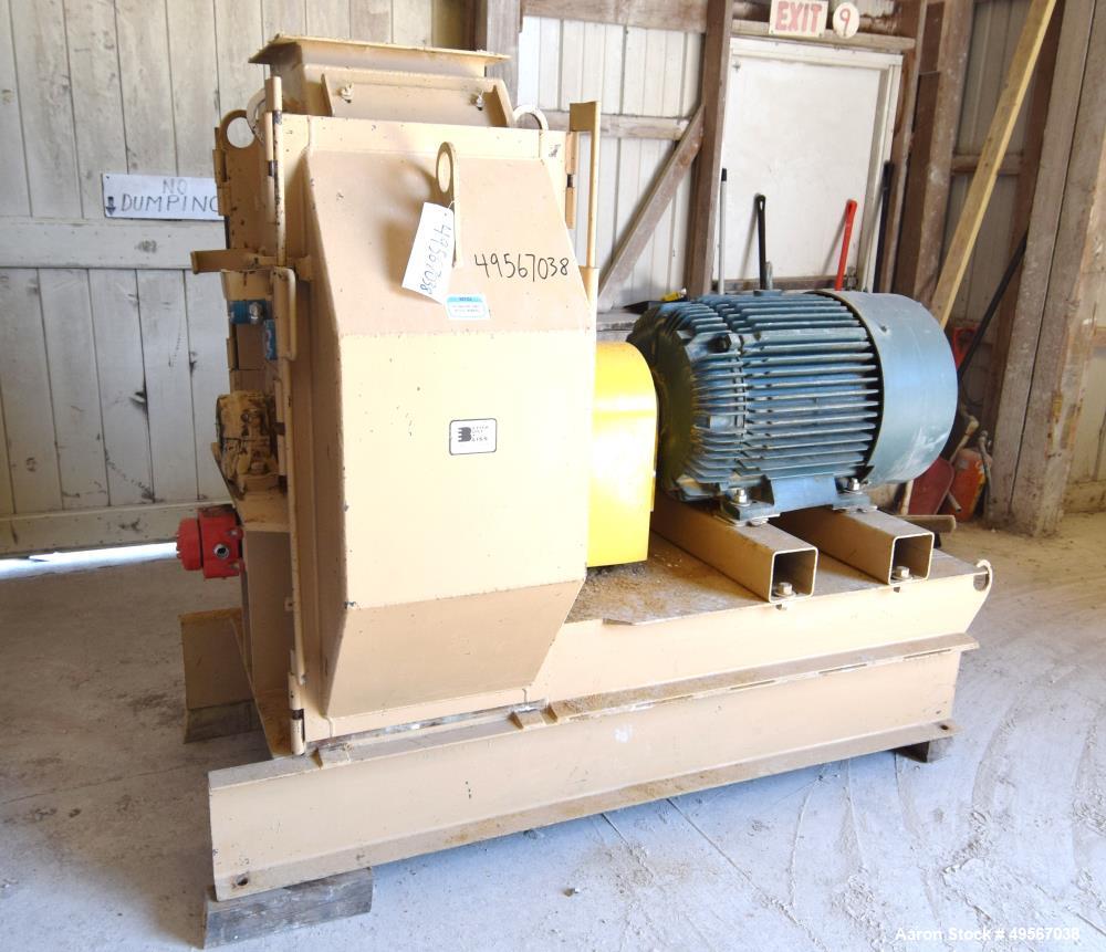 Used Bliss Industries Eliminator Hammer Mill, Model E-3815 TF, Carbon Steel. Approximate 38” diameter x 15” wide rotor with 2-1/2” wide x 1/4” thick swinging hammers. 14" x 12" Top feed with a rotary...