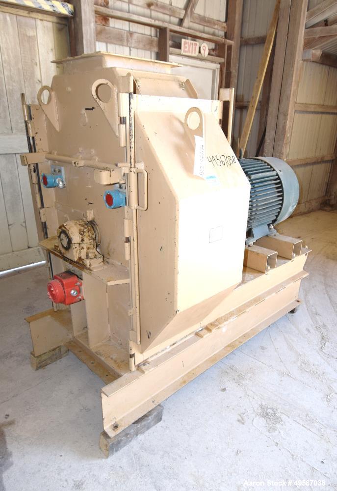 Used Bliss Industries Eliminator Hammer Mill, Model E-3815 TF, Carbon Steel. Approximate 38” diameter x 15” wide rotor with 2-1/2” wide x 1/4” thick swinging hammers. 14" x 12" Top feed with a rotary...