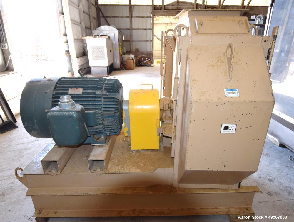 Used Bliss Industries Eliminator Hammer Mill, Model E-3815 TF, Carbon Steel. Approximate 38” diameter x 15” wide rotor with 2-1/2” wide x 1/4” thick swinging hammers. 14" x 12" Top feed with a rotary...