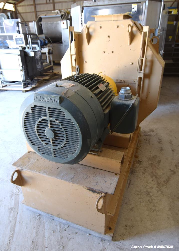 Used Bliss Industries Eliminator Hammer Mill, Model E-3815 TF, Carbon Steel. Approximate 38” diameter x 15” wide rotor with 2-1/2” wide x 1/4” thick swinging hammers. 14" x 12" Top feed with a rotary...
