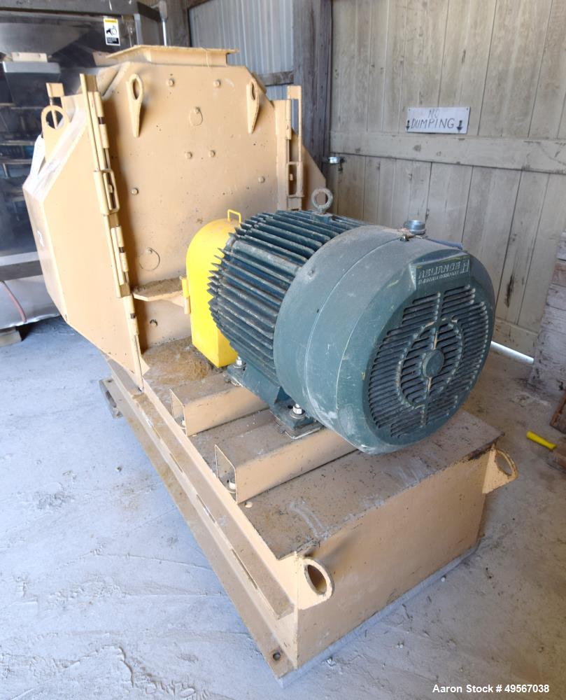 Used Bliss Industries Eliminator Hammer Mill, Model E-3815 TF, Carbon Steel. Approximate 38” diameter x 15” wide rotor with 2-1/2” wide x 1/4” thick swinging hammers. 14" x 12" Top feed with a rotary...