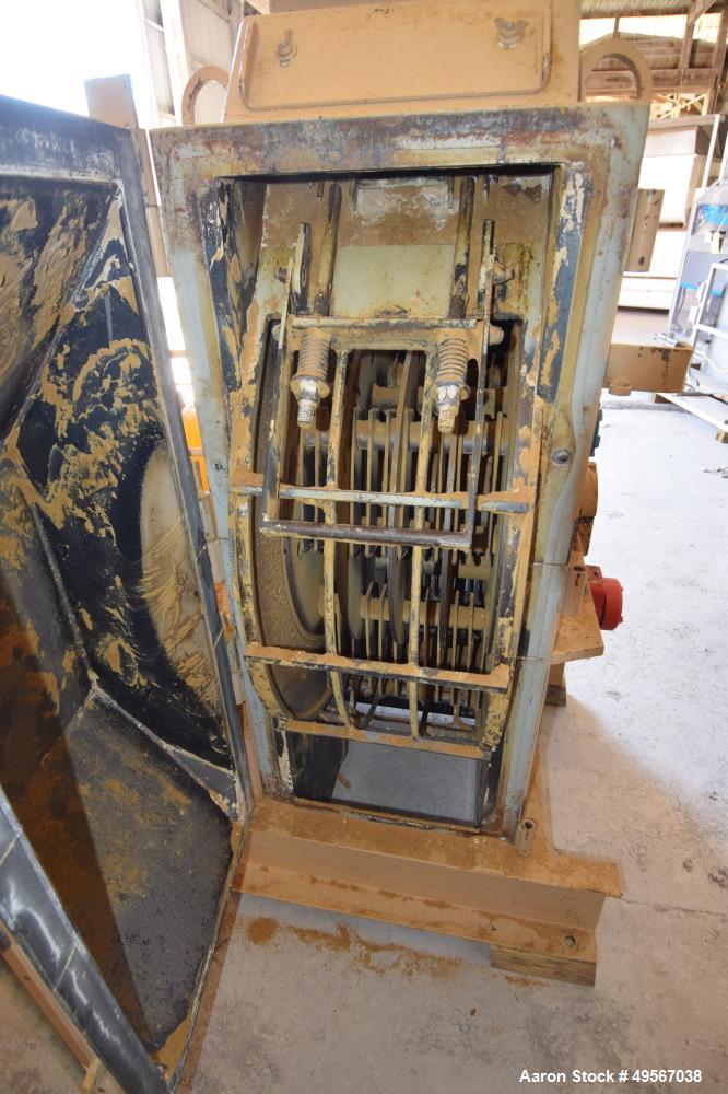 Used Bliss Industries Eliminator Hammer Mill, Model E-3815 TF, Carbon Steel. Approximate 38” diameter x 15” wide rotor with 2-1/2” wide x 1/4” thick swinging hammers. 14" x 12" Top feed with a rotary...