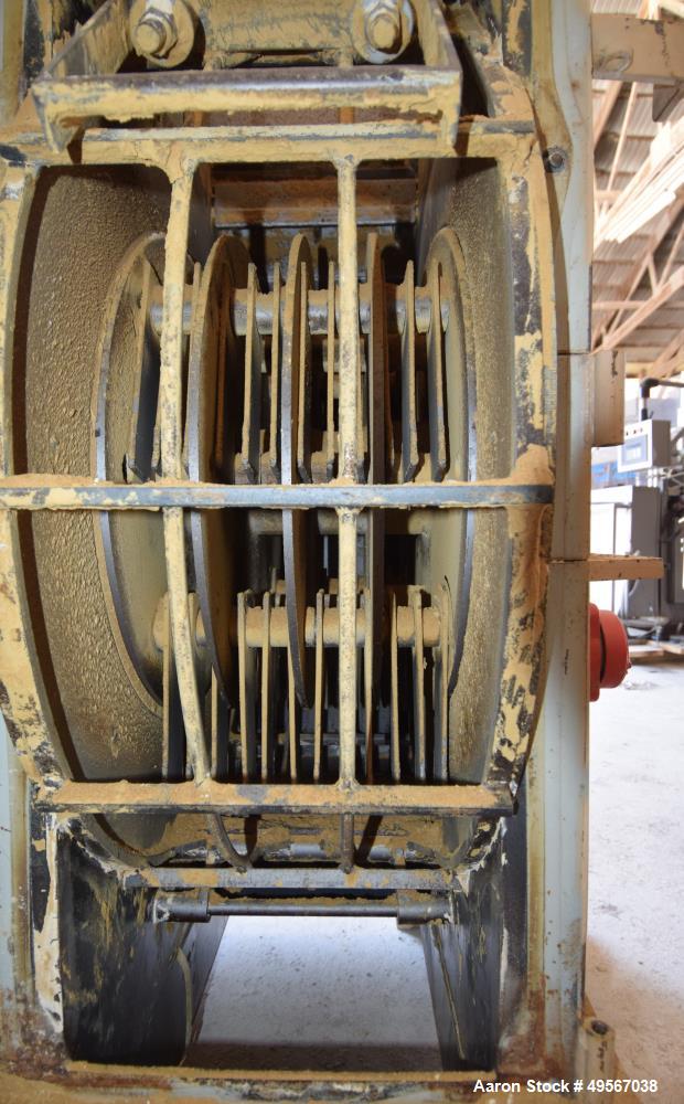 Used Bliss Industries Eliminator Hammer Mill, Model E-3815 TF, Carbon Steel. Approximate 38” diameter x 15” wide rotor with 2-1/2” wide x 1/4” thick swinging hammers. 14" x 12" Top feed with a rotary...