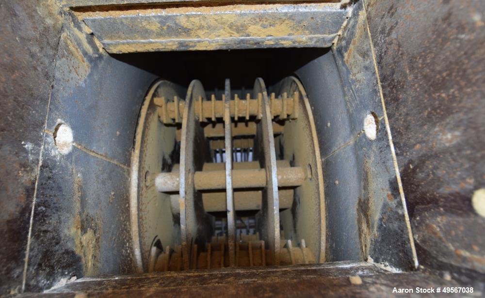 Used Bliss Industries Eliminator Hammer Mill, Model E-3815 TF, Carbon Steel. Approximate 38” diameter x 15” wide rotor with 2-1/2” wide x 1/4” thick swinging hammers. 14" x 12" Top feed with a rotary...