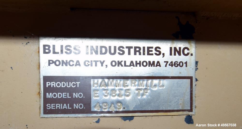 Used Bliss Industries Eliminator Hammer Mill, Model E-3815 TF, Carbon Steel. Approximate 38” diameter x 15” wide rotor with 2-1/2” wide x 1/4” thick swinging hammers. 14" x 12" Top feed with a rotary...