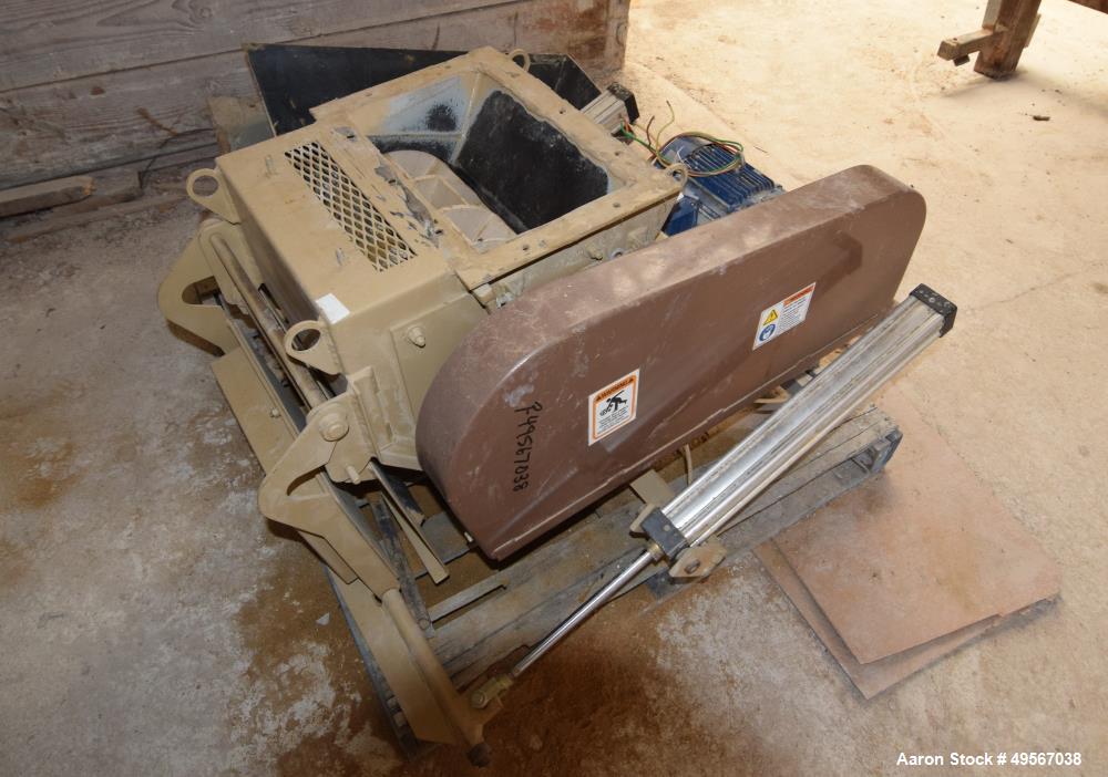 Used Bliss Industries Eliminator Hammer Mill, Model E-3815 TF, Carbon Steel. Approximate 38” diameter x 15” wide rotor with 2-1/2” wide x 1/4” thick swinging hammers. 14" x 12" Top feed with a rotary...