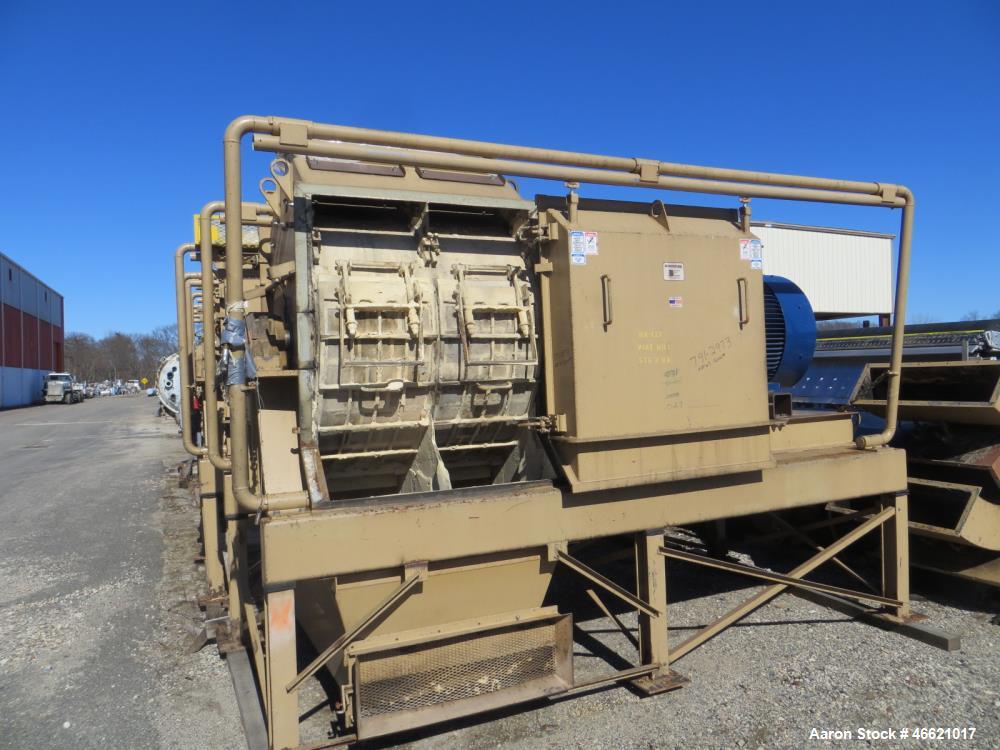 Used Bliss Eliminator Hammer Mill, Model EMFD 4840-TFA. 48" Diameter x 40" wide grinding chamber, on unitized base with 300hp, 230/460 volt motor, with rotary feeder and magnet, serial# 5937. Bliss F...