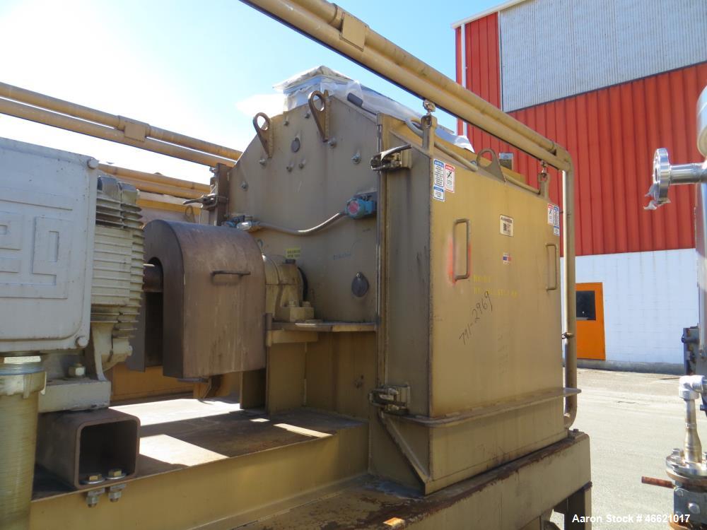 Used Bliss Eliminator Hammer Mill, Model EMFD 4840-TFA. 48" Diameter x 40" wide grinding chamber, on unitized base with 300hp, 230/460 volt motor, with rotary feeder and magnet, serial# 5937. Bliss F...