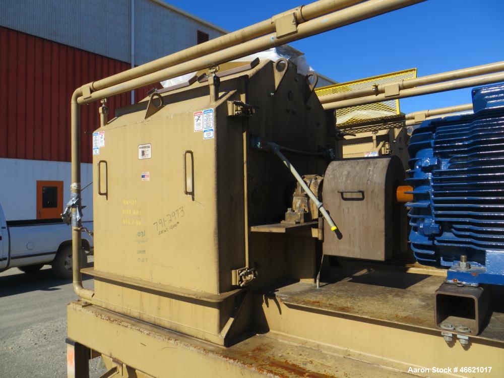 Used Bliss Eliminator Hammer Mill, Model EMFD 4840-TFA. 48" Diameter x 40" wide grinding chamber, on unitized base with 300hp, 230/460 volt motor, with rotary feeder and magnet, serial# 5937. Bliss F...