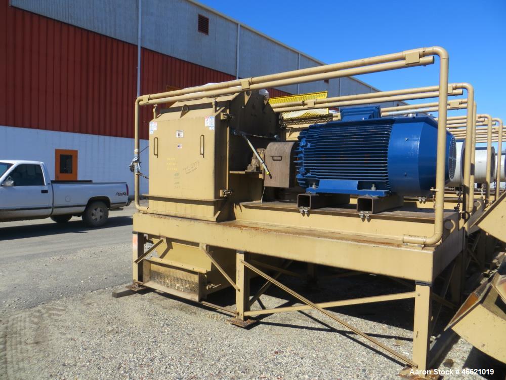 Used Bliss Eliminator Hammer Mill, Model EMFD 4840-TFA. 48" Diameter x 40" wide grinding chamber, on unitized base with 300hp, 230/460 volt motor, with rotary feeder and magnet, serial# 5935. Bliss F...