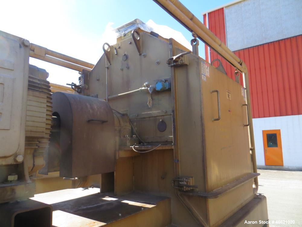 Used Bliss Eliminator Hammer Mill, Model EMFD 4840-TFA. 48" Diameter x 40" wide grinding chamber, on unitized base with 300hp, 230/460 volt motor, with rotary feeder and magnet, serial# 5934. Bliss F...