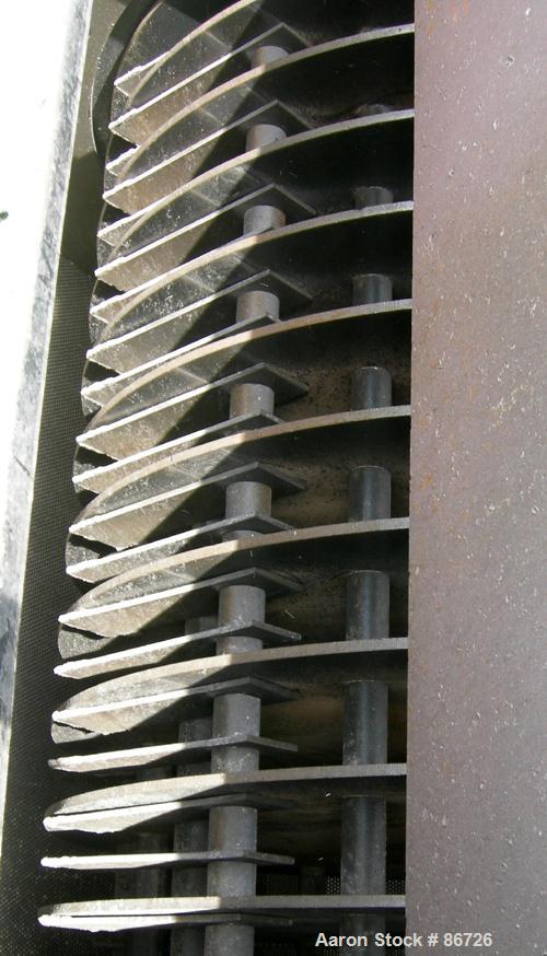 USED: Champion hammermill, model HM54-48, carbon steel. Approximate 54" diameter x 48" wide rotor with (6) rows of (24) 2-1/2" wide x 1/4" thick swing hammers. Teardrop style screen, approximate 7104...