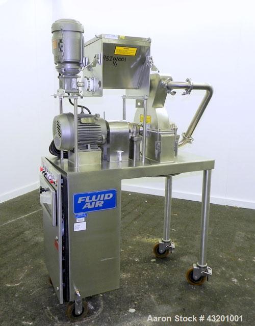 Used Fluid Air Impact/Screening Mill, Model 003, 304 Stainless Steel. 17-4PH Stainless steel fixed rotor with bars, 4’’ x 15’’ cutting chamber with bottom screen. 1-1/2’’ diameter x 15’’ long top scr...
