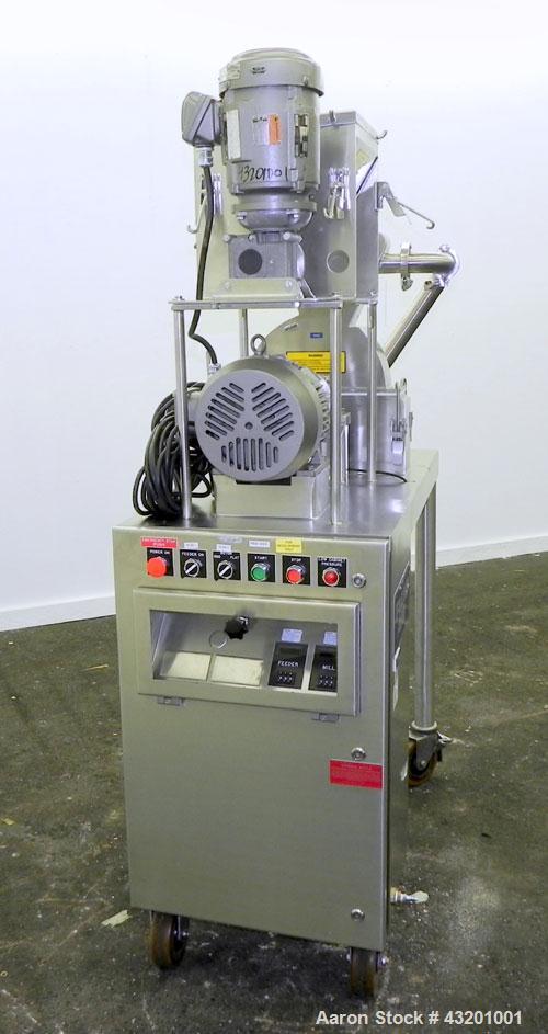 Used Fluid Air Impact/Screening Mill, Model 003, 304 Stainless Steel. 17-4PH Stainless steel fixed rotor with bars, 4’’ x 15’’ cutting chamber with bottom screen. 1-1/2’’ diameter x 15’’ long top scr...