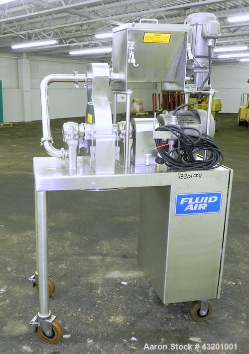 Used Fluid Air Impact/Screening Mill, Model 003, 304 Stainless Steel. 17-4PH Stainless steel fixed rotor with bars, 4’’ x 15’’ cutting chamber with bottom screen. 1-1/2’’ diameter x 15’’ long top scr...