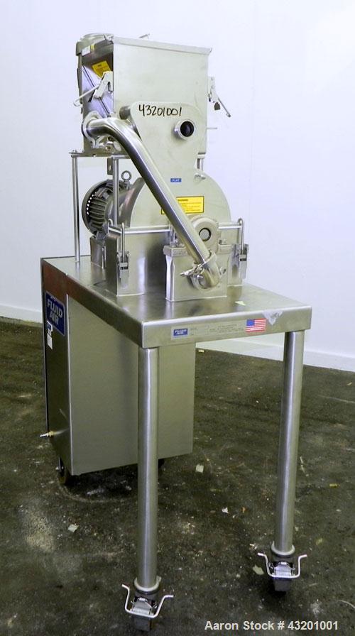 Used Fluid Air Impact/Screening Mill, Model 003, 304 Stainless Steel. 17-4PH Stainless steel fixed rotor with bars, 4’’ x 15’’ cutting chamber with bottom screen. 1-1/2’’ diameter x 15’’ long top scr...