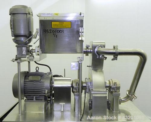 Used Fluid Air Impact/Screening Mill, Model 003, 304 Stainless Steel. 17-4PH Stainless steel fixed rotor with bars, 4’’ x 15’’ cutting chamber with bottom screen. 1-1/2’’ diameter x 15’’ long top scr...