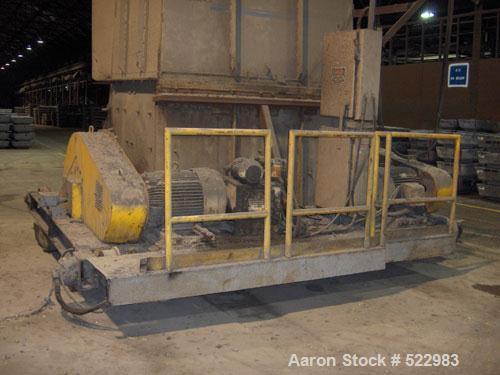 USED: T J Gundlach Machine Company crusher/breaker, model 972-140060. Crusher rollers driven by (2) 75 hp motors. Length 144-1/2", width 179-3/8", height with hopper 151-1/16"; height with upper hopp...
