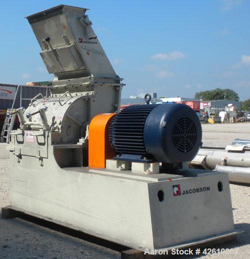 Used Jacobson Commander Half Circle Hammer Mill, model 2424, carbon steel. Approximate 24" diameter x 24" wide rotor with 1/4" thick swinging hammers. 837 Square inch screen area. (1) Access door, to...