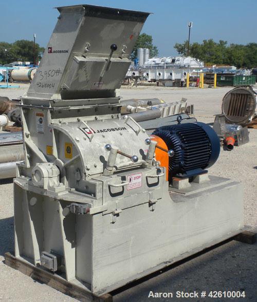 Used Jacobson Commander Half Circle Hammer Mill, model 2424, carbon steel. Approximate 24" diameter x 24" wide rotor with 1/4" thick swinging hammers. 837 Square inch screen area. (1) Access door, to...