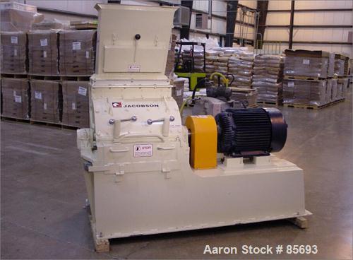 Unused-UNUSED: Jacobson half circle Commander model 2424D hammermill. Carbon steel. Rotor is standard staggered, hardfaced hammers. Approx 837 square inches of screen area. Access door. Top feed, bot...