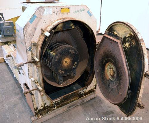 Used Jacobson Series 1 Full Circle Hammermill, Model P-241DFF, Carbon Steel.Approximately 14" diameter x 9" wide rotor with approximately " thick swinging blades.9-1/2" wide teardrop shaped screen, 8...