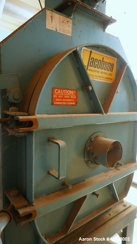 Used Jacobson Hammer Mill, Model P195TDF, Carbon Steel. 25HP 230/460V. 8 screens, dust collector. Available with or without the elevated stand, bins and augers shown. Can process up to 3750 pounds of...