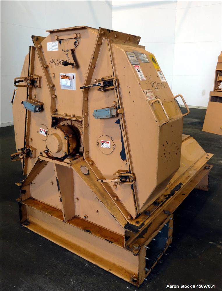 Used Jacobson Machine Works (Carter Day) Full Circle Hammer Mill Model XLT-42315. (4) Rows of (12) 1/4" thick hammers. 10" x 13" top gravity feed, 15" x 9" bottom outlet. Driven by a 75 hp, 230-460 v...