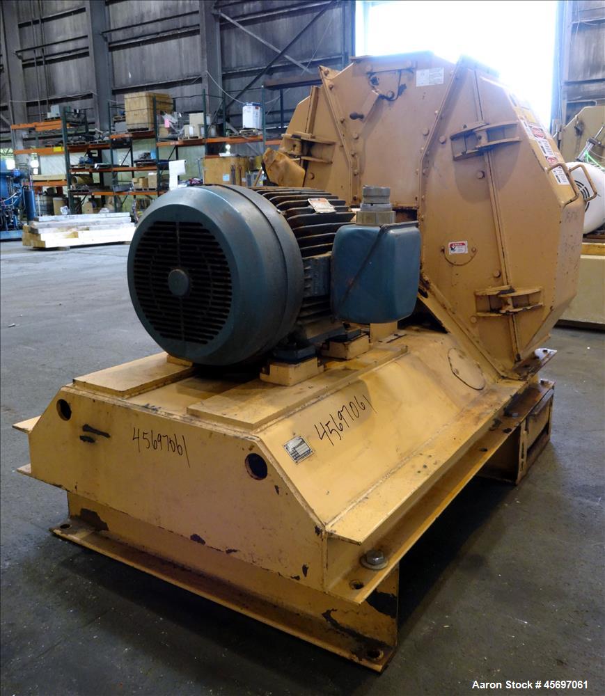 Used Jacobson Machine Works (Carter Day) Full Circle Hammer Mill Model XLT-42315. (4) Rows of (12) 1/4" thick hammers. 10" x 13" top gravity feed, 15" x 9" bottom outlet. Driven by a 75 hp, 230-460 v...
