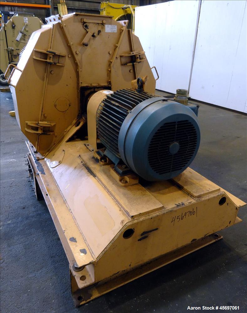 Used Jacobson Machine Works (Carter Day) Full Circle Hammer Mill Model XLT-42315. (4) Rows of (12) 1/4" thick hammers. 10" x 13" top gravity feed, 15" x 9" bottom outlet. Driven by a 75 hp, 230-460 v...