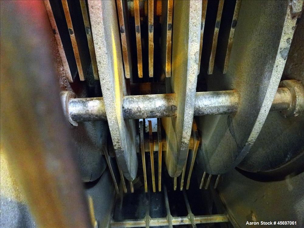 Used Jacobson Machine Works (Carter Day) Full Circle Hammer Mill Model XLT-42315. (4) Rows of (12) 1/4" thick hammers. 10" x 13" top gravity feed, 15" x 9" bottom outlet. Driven by a 75 hp, 230-460 v...