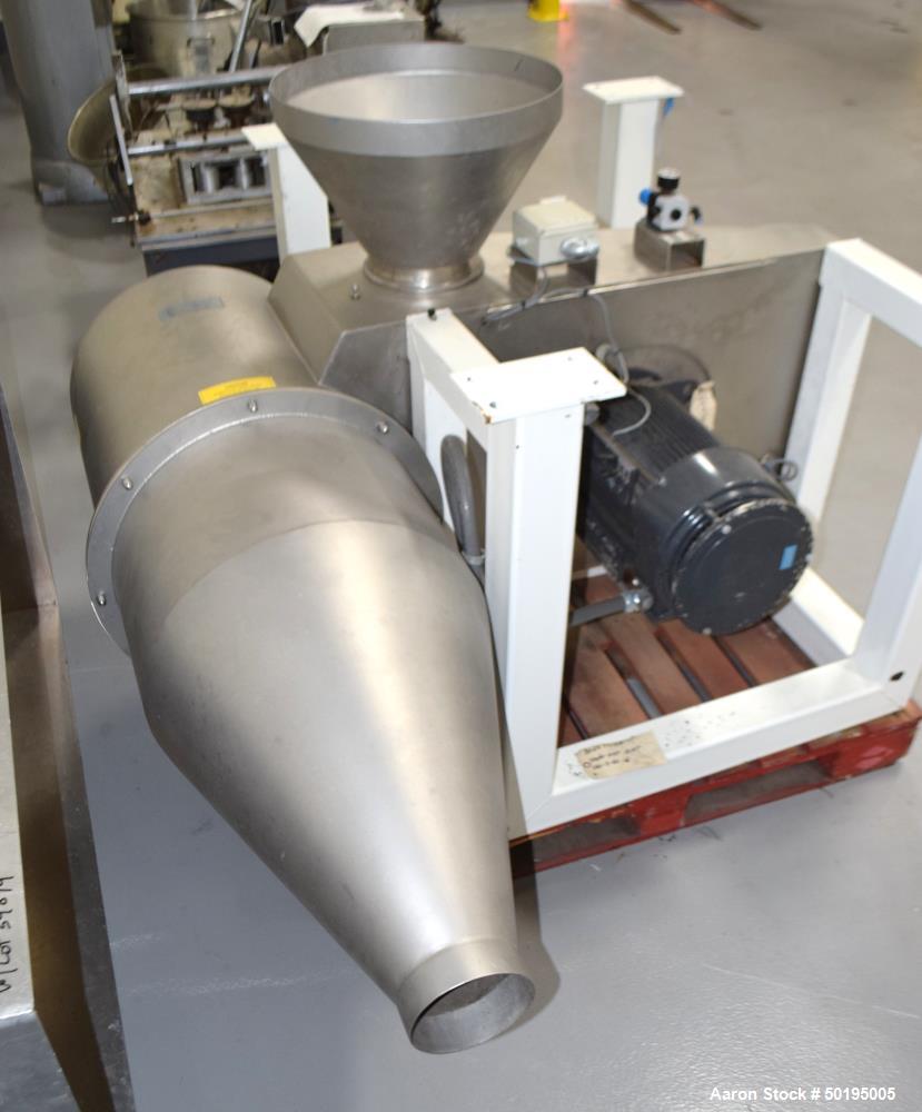 Used Kemutec Kek Cone Mill, Stainless Steel. Top feed with hopper, bottom discharge. Includes beater bar and screen. Driven by a 10hp motor. Mounted on a carbon steel frame. Includes an aluminum pan....
