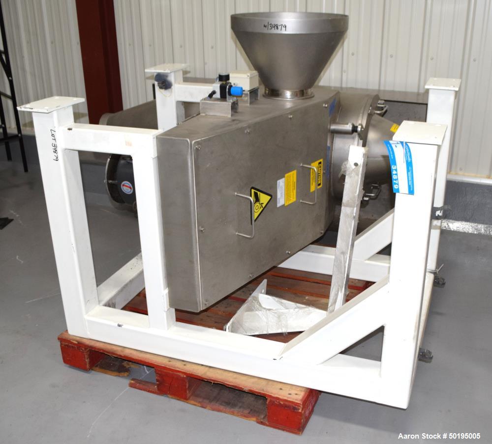 Used Kemutec Kek Cone Mill, Stainless Steel. Top feed with hopper, bottom discharge. Includes beater bar and screen. Driven by a 10hp motor. Mounted on a carbon steel frame. Includes an aluminum pan....