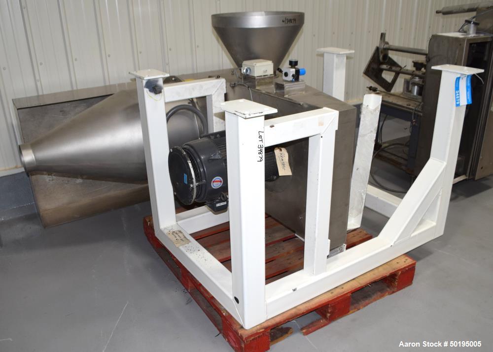 Used Kemutec Kek Cone Mill, Stainless Steel. Top feed with hopper, bottom discharge. Includes beater bar and screen. Driven by a 10hp motor. Mounted on a carbon steel frame. Includes an aluminum pan....