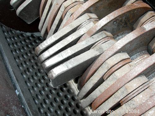 USED: Magnatech Engineering Hammermill, model 24X30HMDR, carbon steel. 19" x 32" top feed, no hopper, bottom discharge. (4) Rows of (20) 3-1/2" wide x 1" thick swinging hammers. Approximate 1" diamet...