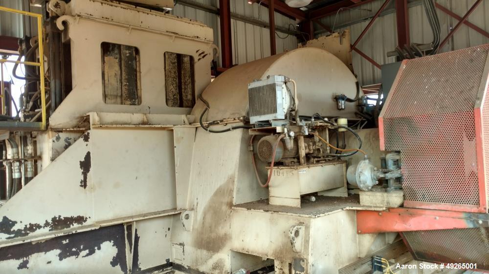 Used Pallmann Universal Long Log Flaker, Type PZU 19-600. Spec for 700 Kw / 938 hp. Inside max : 400. The voltage on this unit is 3 phase 480 volt for all of the motors and 120 volt and 24 volt for t...